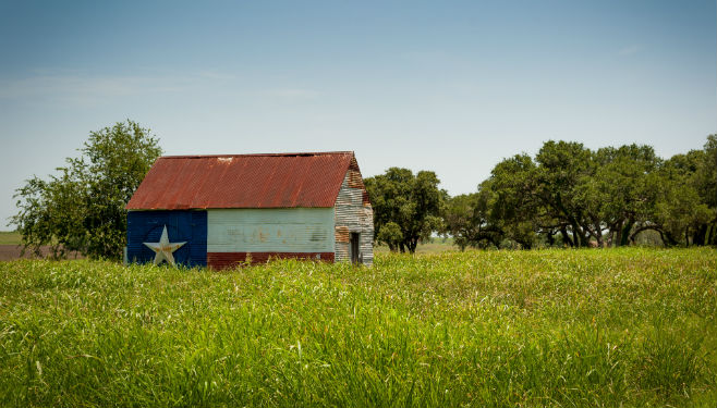 house painted with Texas flag