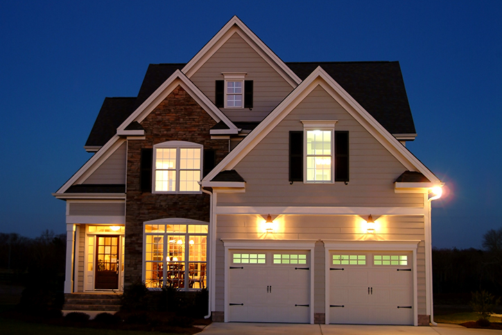 house with lights on at night